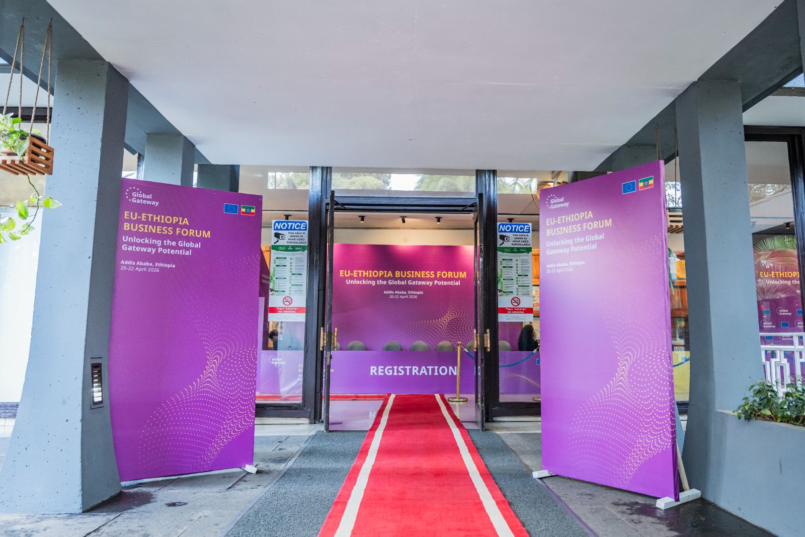 Red carpet entrance to the EU / Ethiopia Business Forum flanked by branded Global Gateway banners